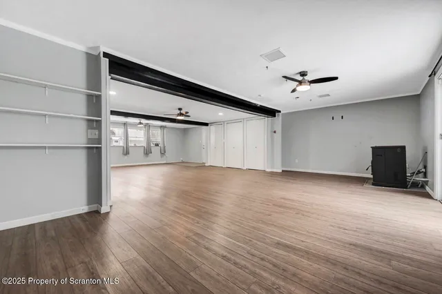 a view of a house with backyard and porch