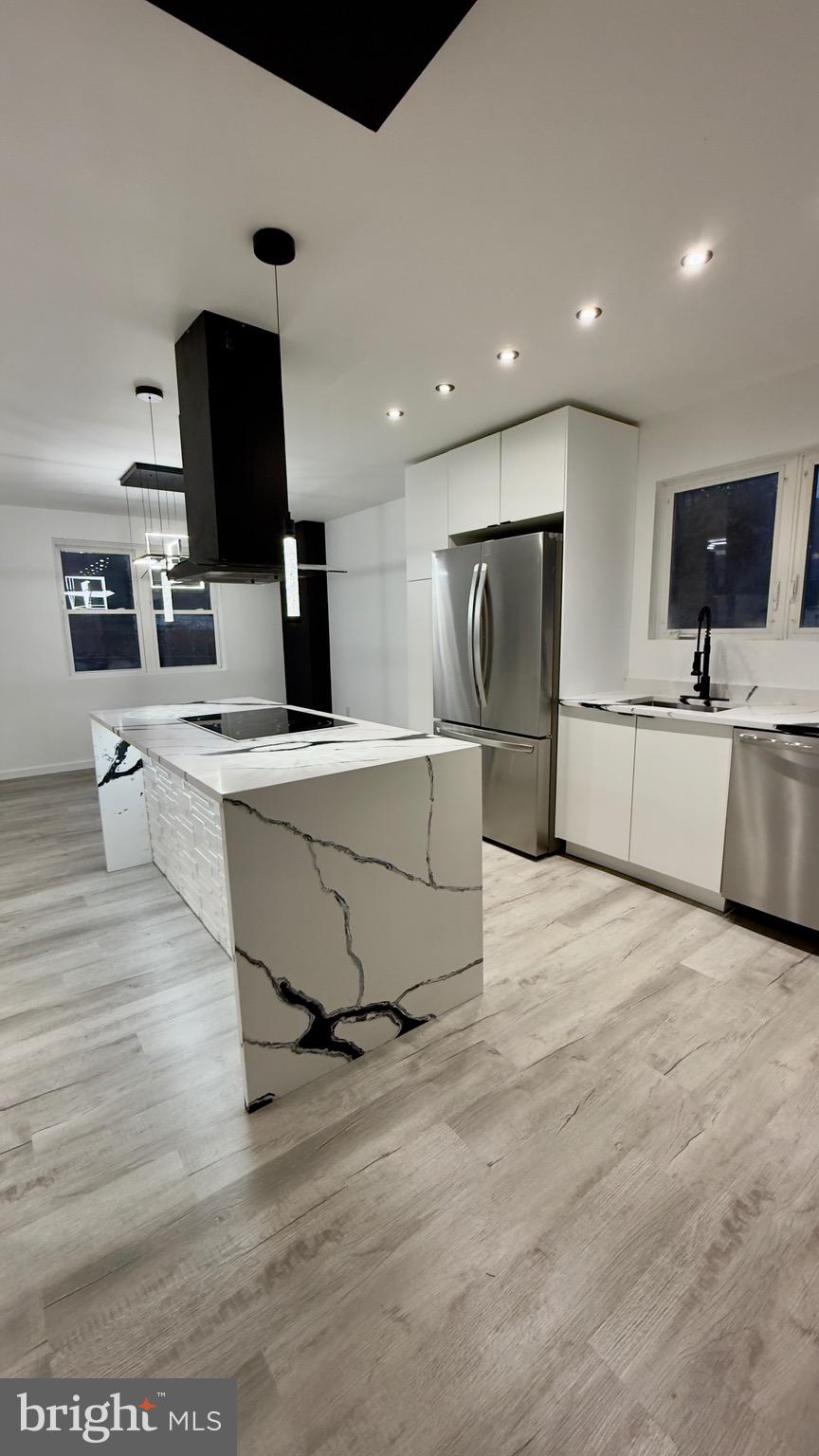 2319 Fairview Avenue Reading, PA 19606 - Photo 13 of 58 a living room with stainless steel appliances furniture and a flat screen tv
