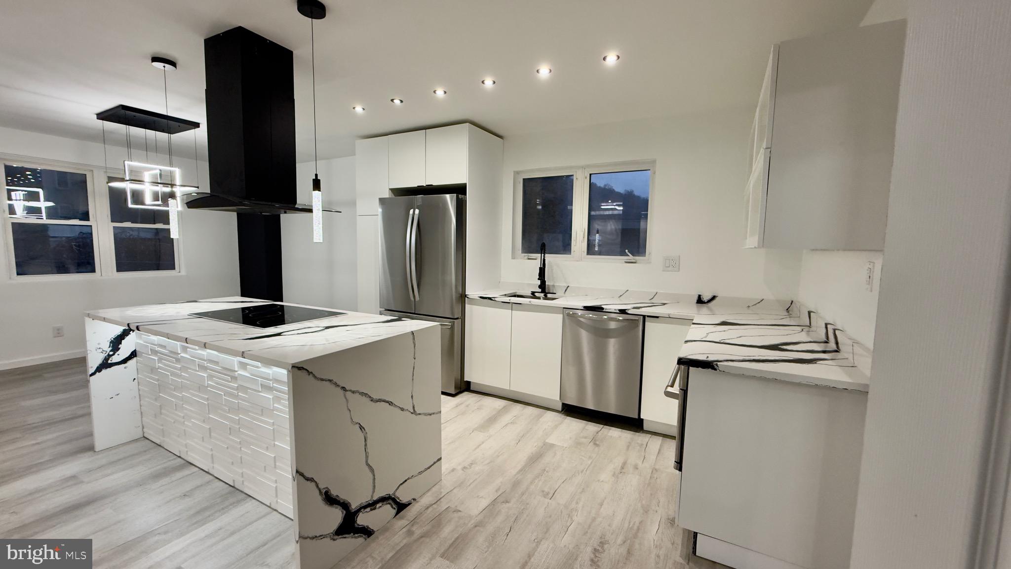 2319 Fairview Avenue Reading, PA 19606 - Photo 15 of 58 a kitchen with a sink a stove and refrigerator