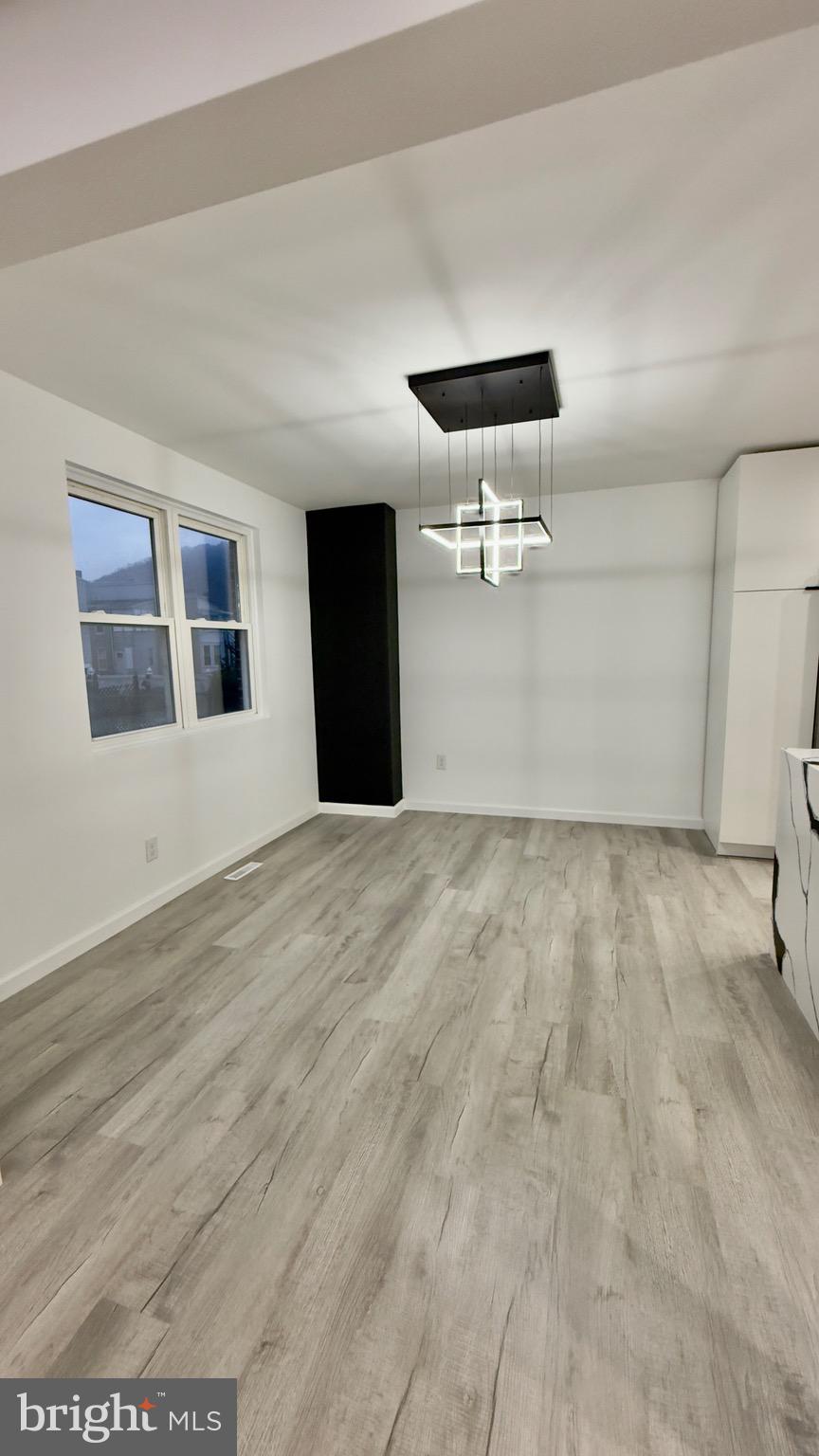 2319 Fairview Avenue Reading, PA 19606 - Photo 17 of 58 a view of empty room with wooden floor