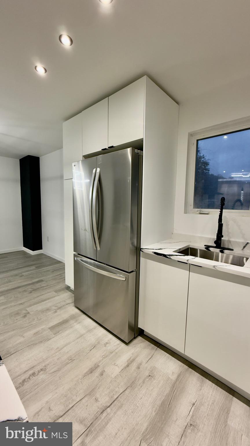 2319 Fairview Avenue Reading, PA 19606 - Photo 19 of 58 a kitchen with stainless steel appliances a refrigerator sink and cabinets