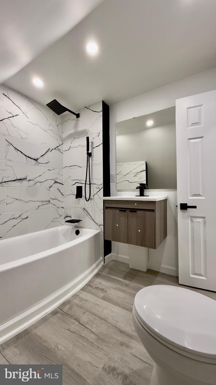2319 Fairview Avenue Reading, PA 19606 - Photo 27 of 58 a bathroom with a tub toilet sink and mirror