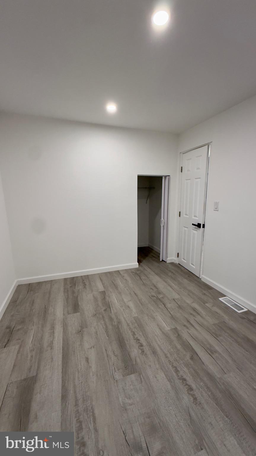 2319 Fairview Avenue Reading, PA 19606 - Photo 40 of 58 a view of an empty room and wooden floor