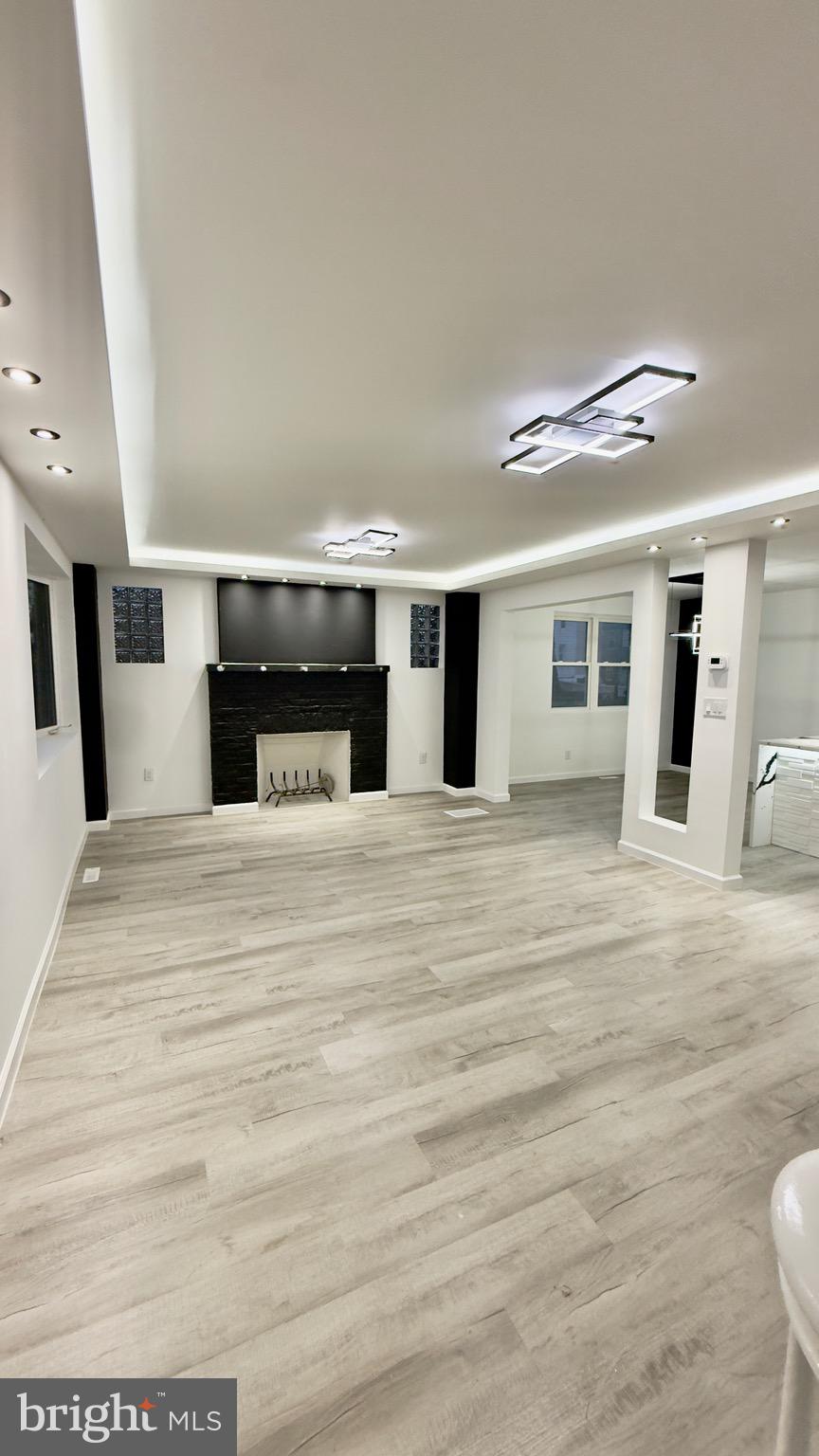 2319 Fairview Avenue Reading, PA 19606 - Photo 8 of 58 a large white kitchen with stainless steel appliances kitchen island