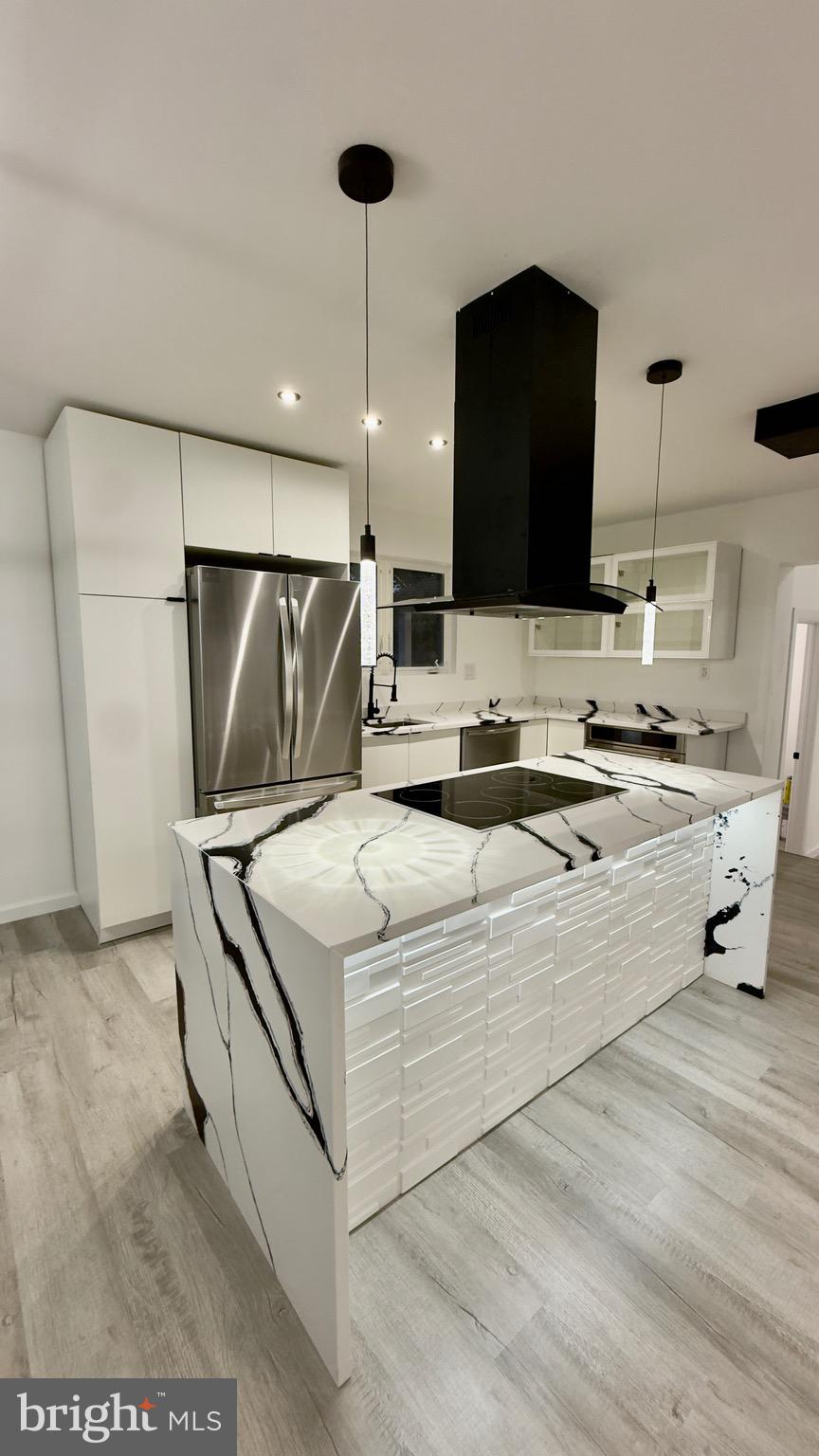 2319 Fairview Avenue Reading, PA 19606 - Photo 10 of 58 a kitchen with kitchen island stainless steel appliances a sink a counter top space and cabinets