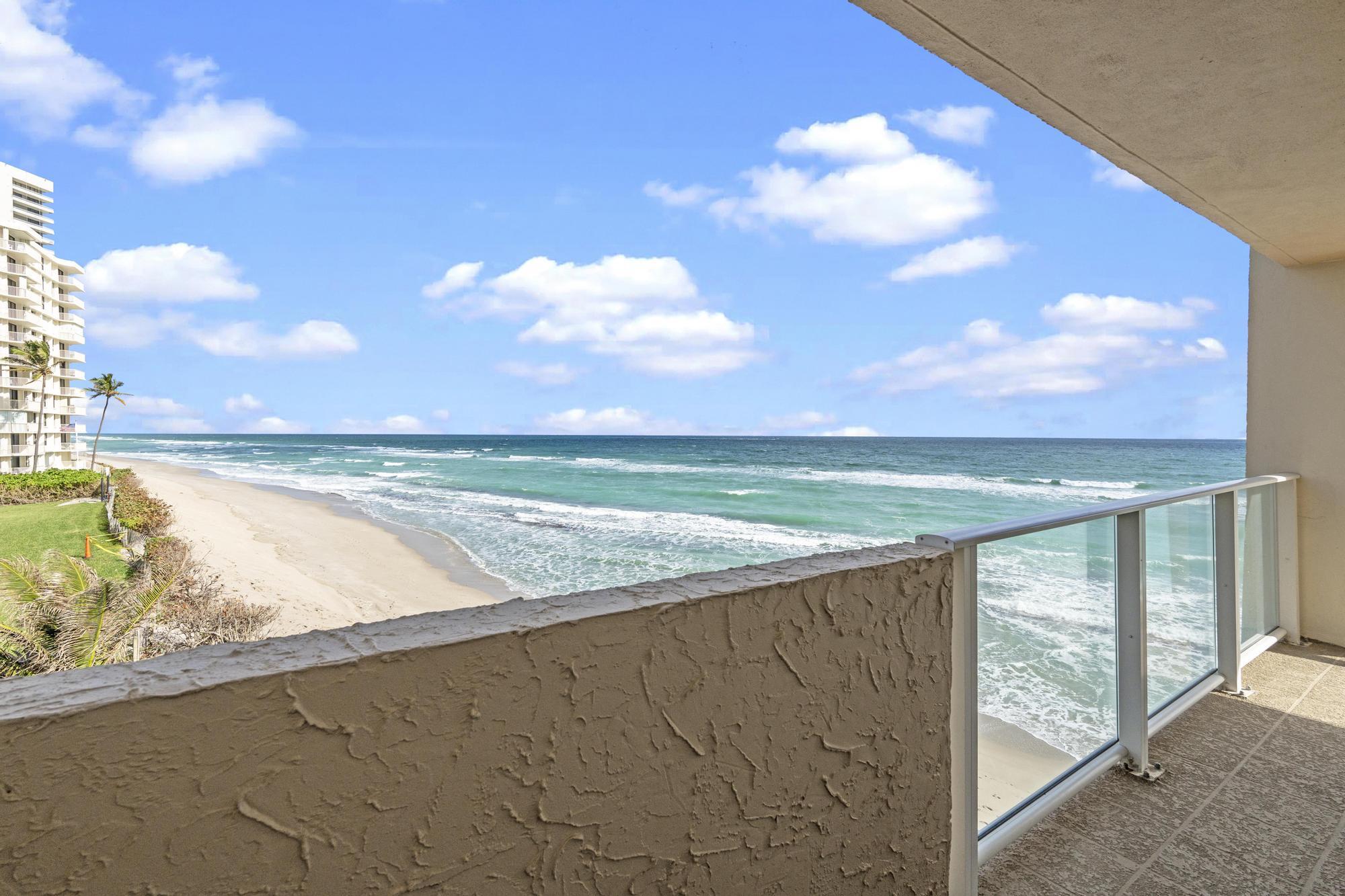 5440 North Ocean Drive, Unit 306 Singer Island, FL 33404 - Photo 16 of 43 a view of an ocean and beach