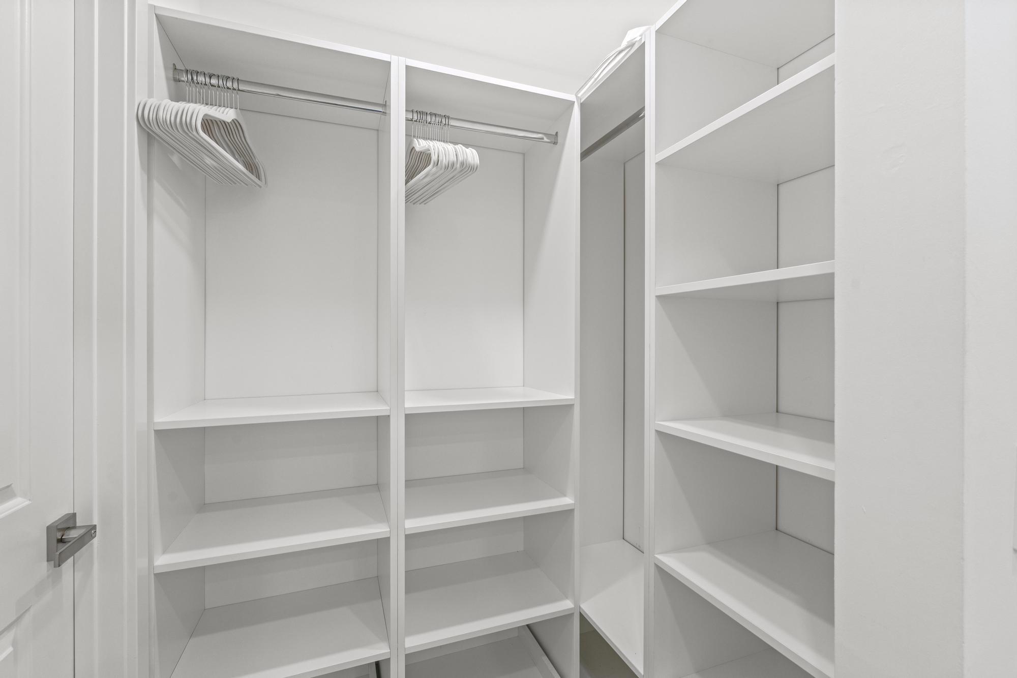 5440 North Ocean Drive, Unit 306 Singer Island, FL 33404 - Photo 29 of 43 a view of walk in closet with empty racks