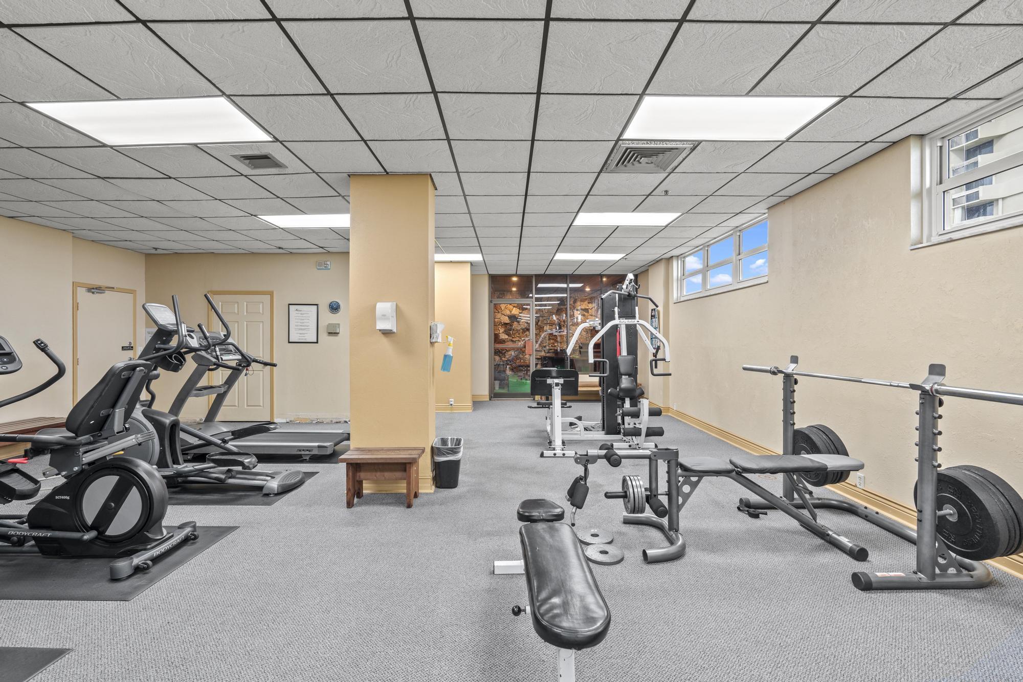 5440 North Ocean Drive, Unit 306 Singer Island, FL 33404 - Photo 35 of 43 a view of a room with gym equipment