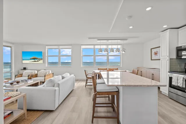 a living room with furniture and a table