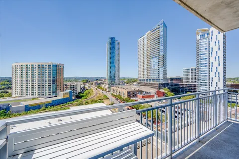 a view of balcony with furniture