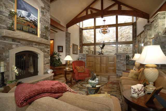 418 Wrights Road Aspen, CO 81612 - Photo 2 of 9 a living room with furniture and a fireplace