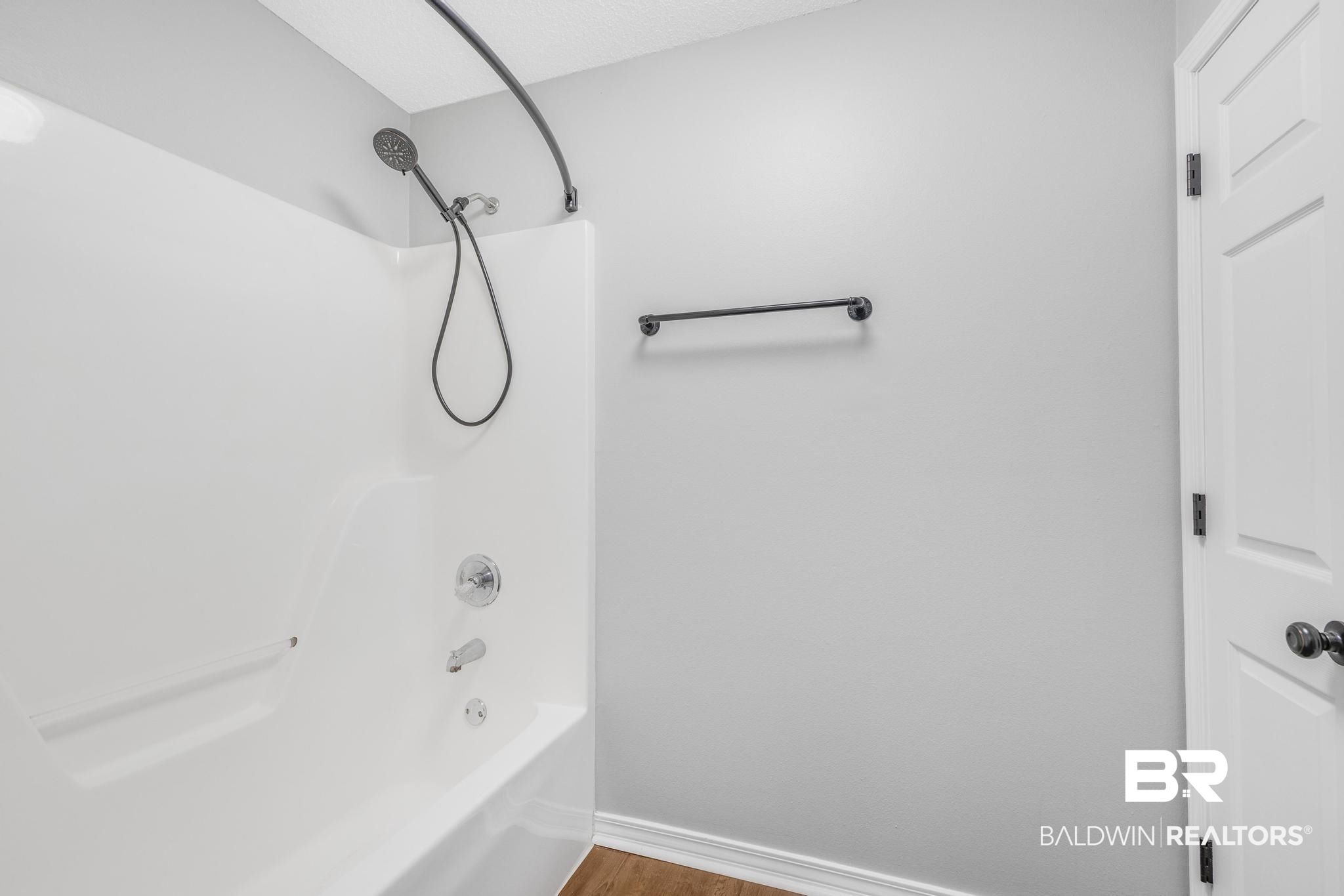 140 Hope Drive Daphne, AL 36526 - Photo 26 of 54 Full bath featuring bathing tub / shower combination and wood finished floors