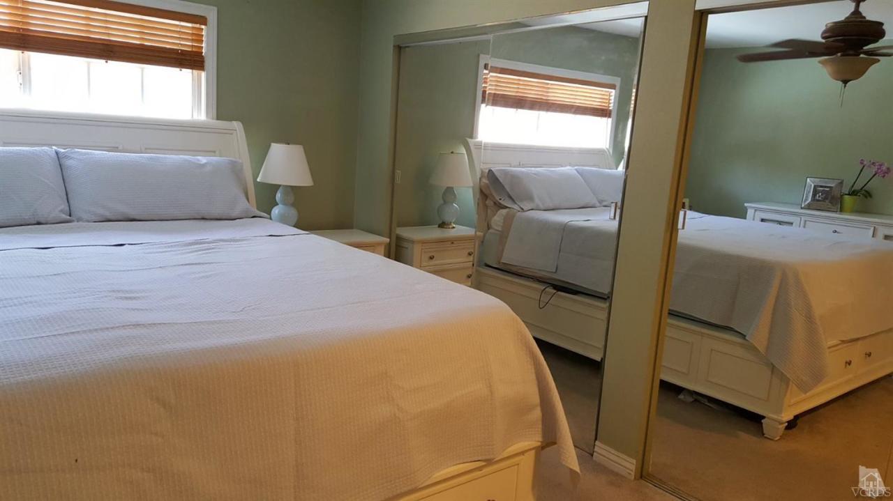 6392 White Street Simi Valley, CA 93063 - Photo 14 of 30 a bedroom with a bed and a window