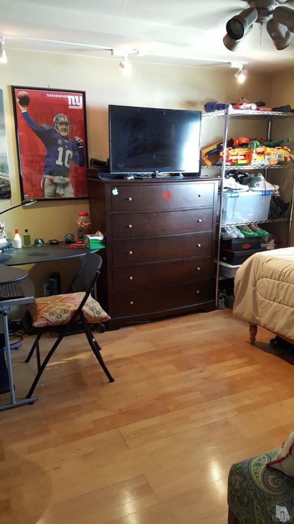6392 White Street Simi Valley, CA 93063 - Photo 15 of 30 a room with furniture and a flat screen tv
