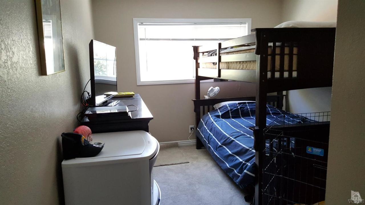 6392 White Street Simi Valley, CA 93063 - Photo 17 of 30 a bedroom with bed and window