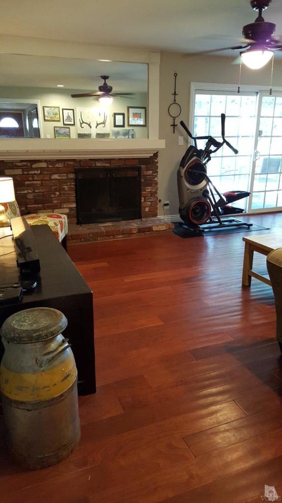 6392 White Street Simi Valley, CA 93063 - Photo 2 of 30 a living room with furniture and a fireplace