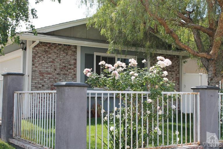 6392 White Street Simi Valley, CA 93063 - Photo 26 of 30 a front view of a house with a garden