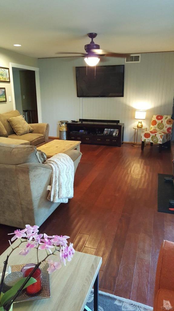 6392 White Street Simi Valley, CA 93063 - Photo 3 of 30 a bedroom with a bed and wooden floor