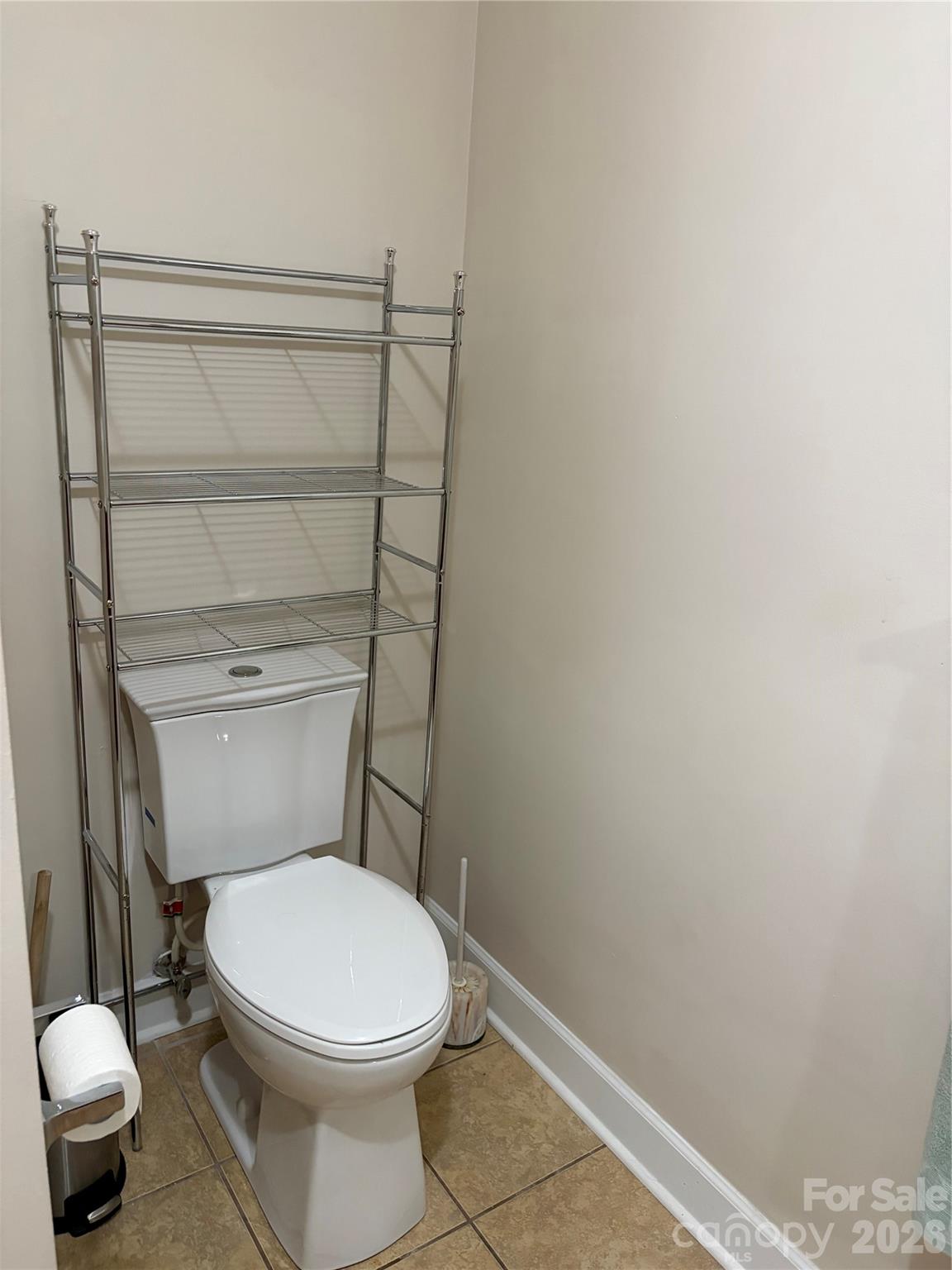 256 A Bruce Road Mars Hill, NC 28754 - Photo 24 of 39 a white toilet sitting next to a shower