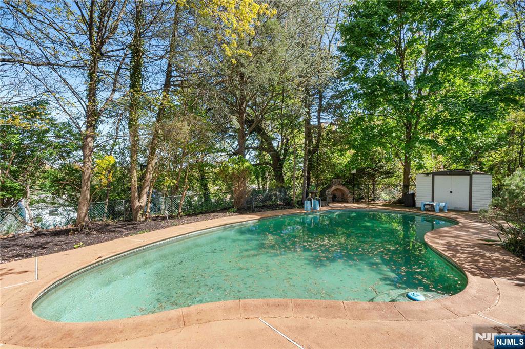 1675 Broad Street Bloomfield, NJ 07003 - Photo 26 of 35 a view of a backyard with large trees