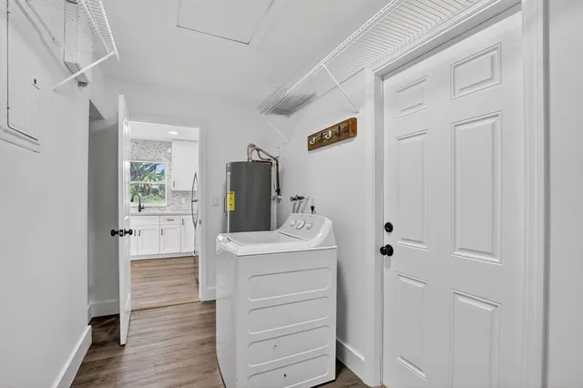 a room that has a dresser in it