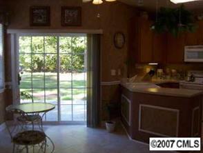 2015 Standing Timber Road Lancaster, SC 29720 - Photo 5 of 8 a kitchen with a sink cabinets and a table