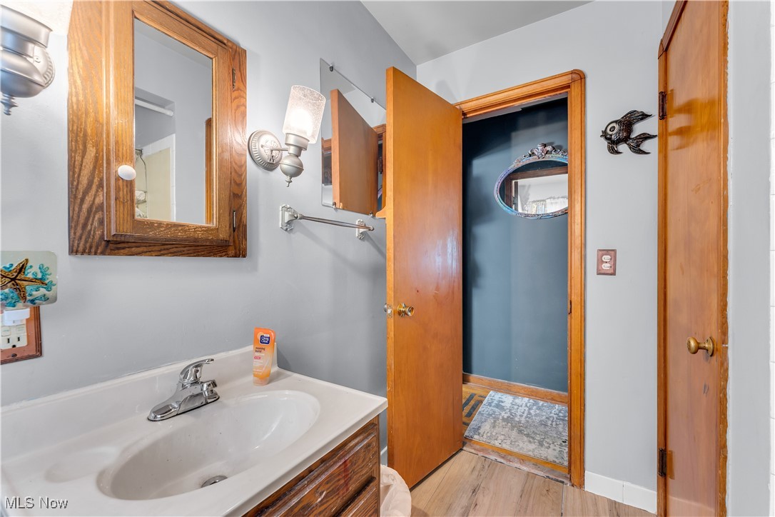 141 East Sprague Road Independence, OH 44131 - Photo 20 of 27 Bathroom with vanity and hardwood / wood-style flooring