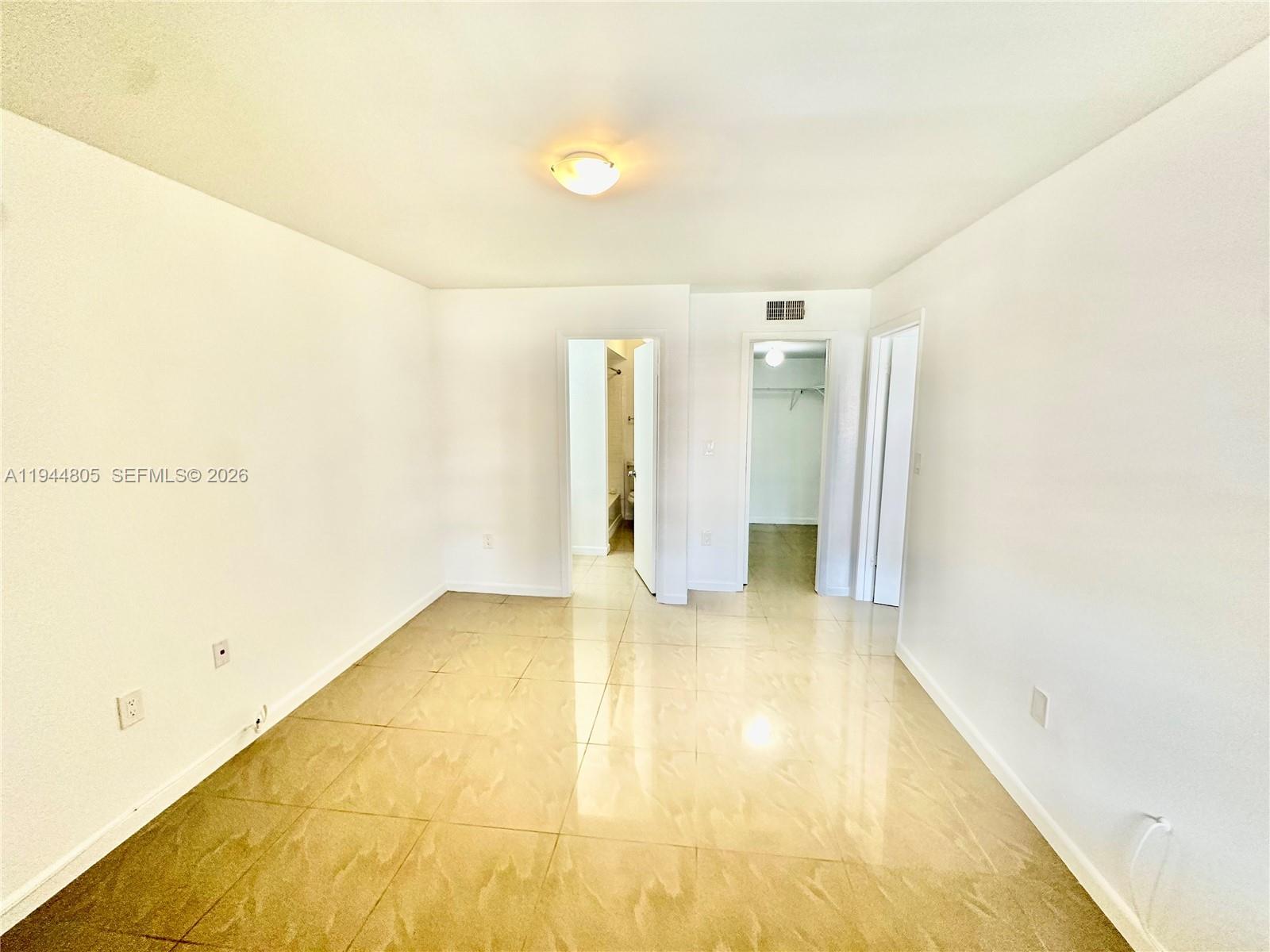 10440 Southwest 156th Court, Unit 722 Miami, FL 33196 - Photo 7 of 23 a view of an empty room
