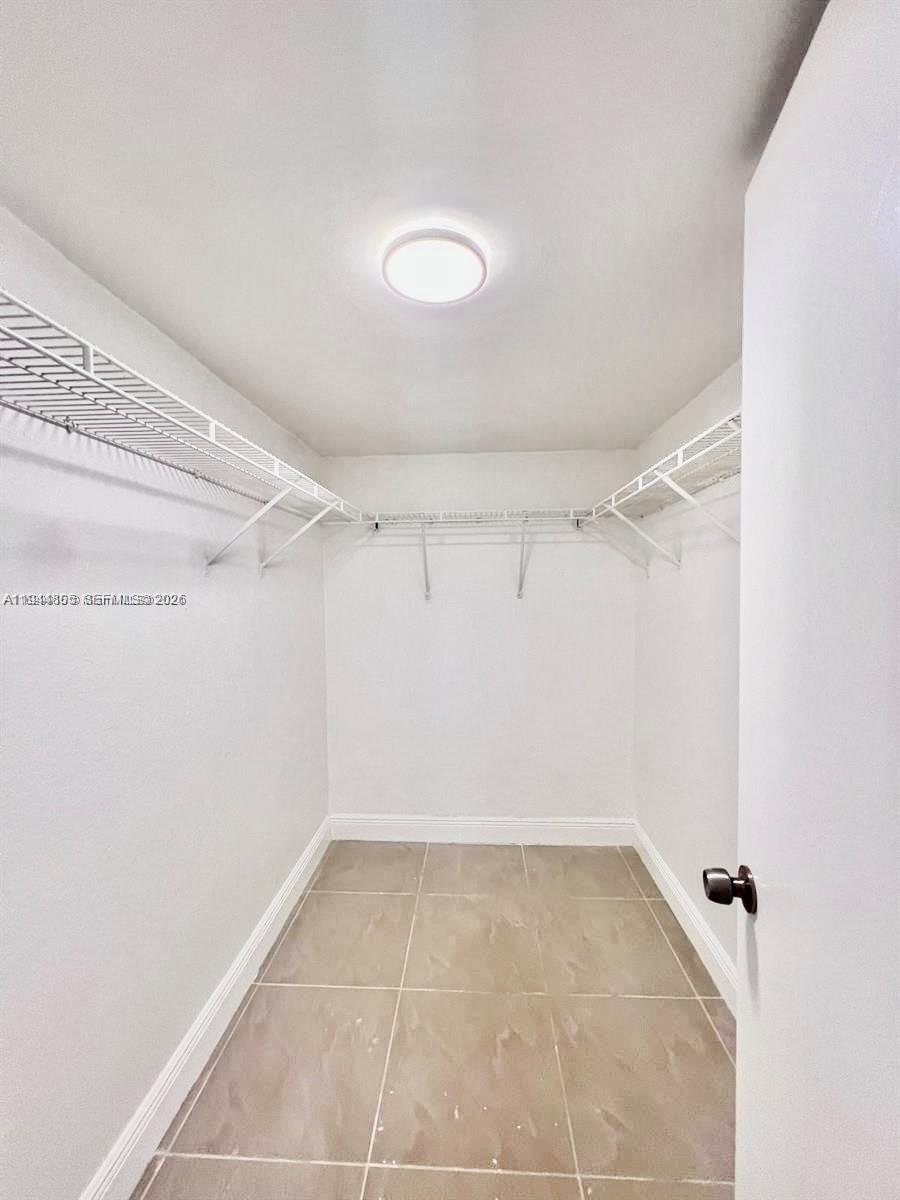 10440 Southwest 156th Court, Unit 722 Miami, FL 33196 - Photo 10 of 23 a view of an empty room