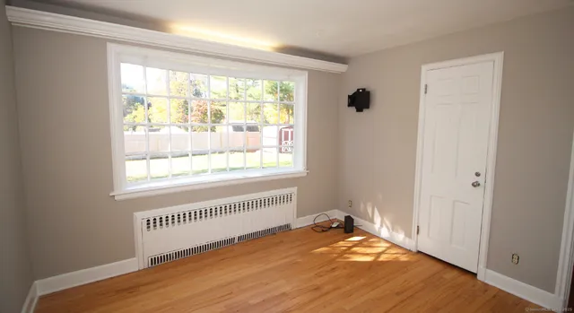 a view of an empty room and window