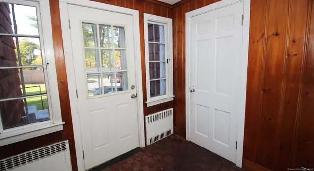 a bathroom with a bathtub and shower