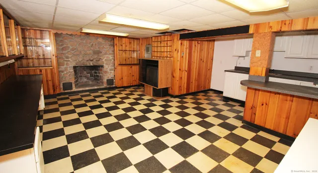 a view of an empty room with a garage