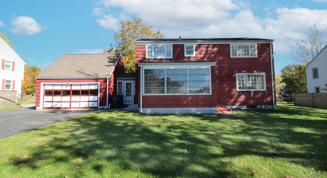 a view of a back yard of the house
