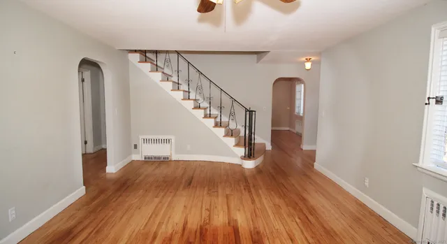a view of entryway with wooden floor