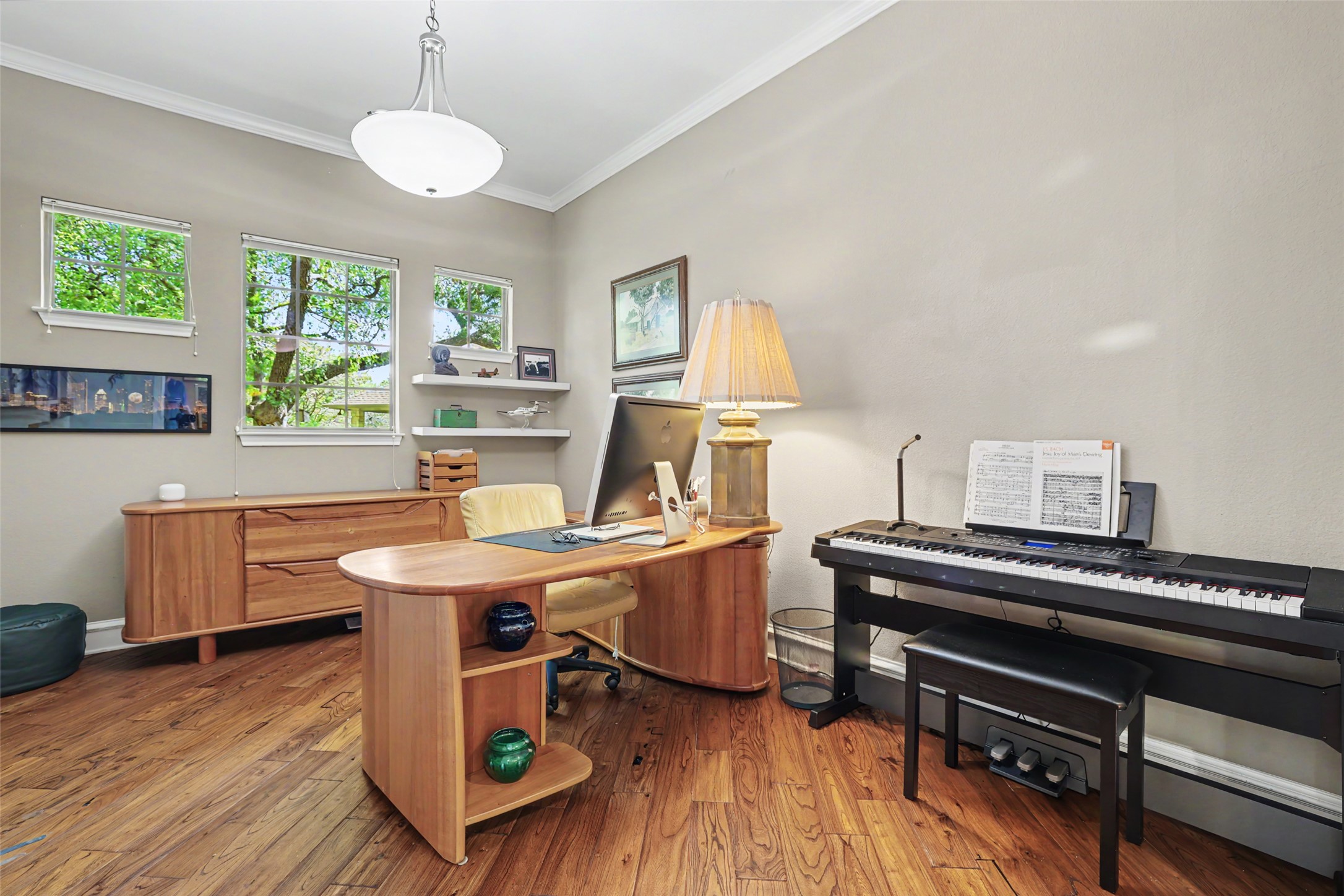 805 Boquilla Trail Georgetown, TX 78633 - Photo 8 of 40 a view of a workspace with furniture and a window