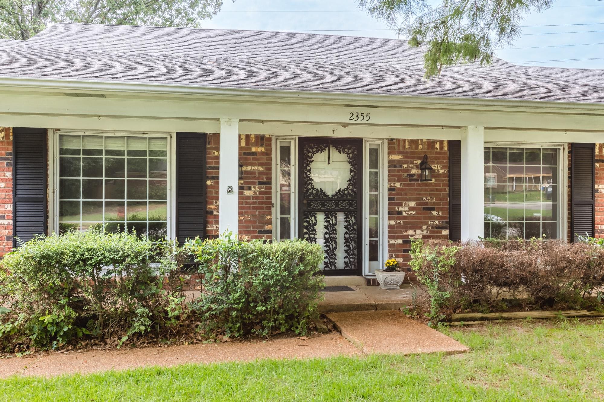 2355 Lynnfield Road Memphis, TN 38119 - Photo 3 of 25 a front view of a house with a yard