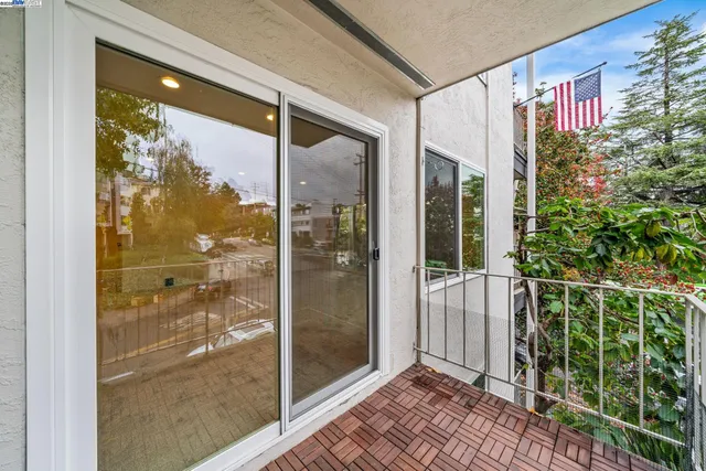 a kitchen with stainless steel appliances a stove a sink and a microwave