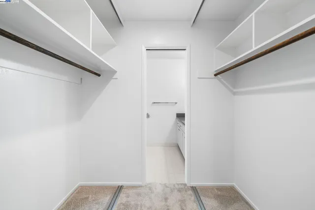 a room with a sink and closet