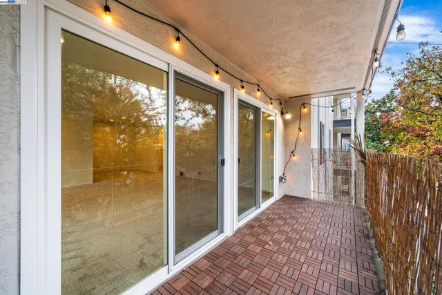 a view of a big room with a large window