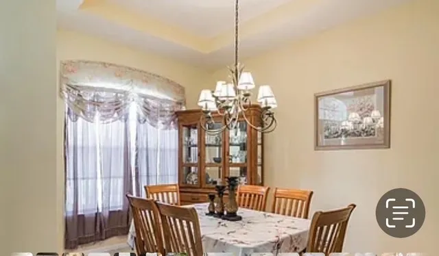 a view of a livingroom with furniture and window