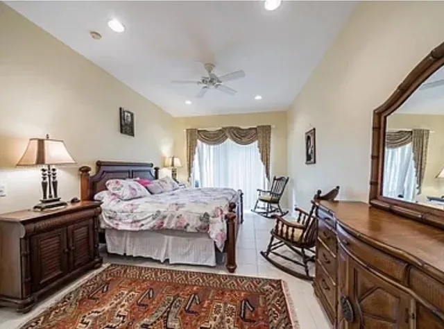 a bed room with a bed and furniture