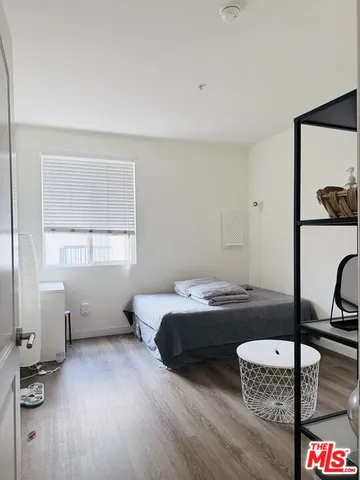 a room with a bed and a table