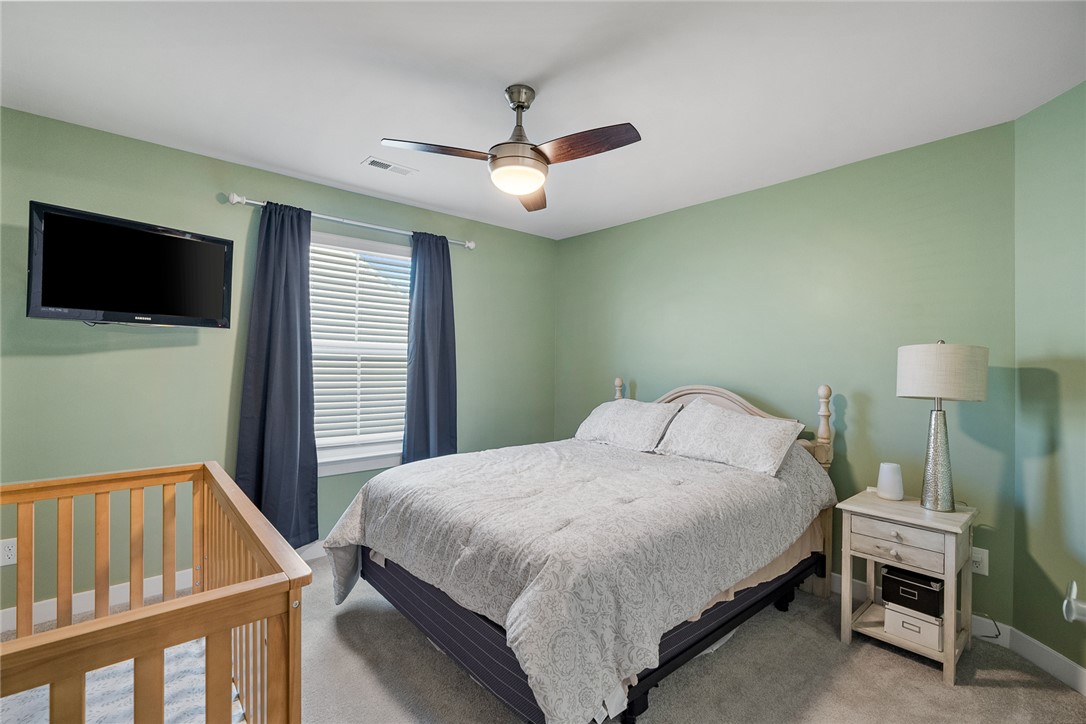 115 Bronson Ridge Anderson, SC 29621 - Photo 34 of 42 This serene bedroom offers a restful retreat, complete with ample light and comfortable features.
