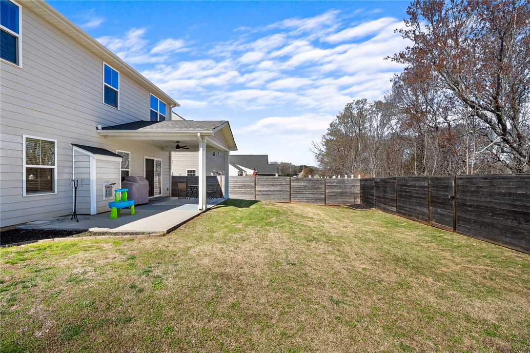 115 Bronson Ridge Anderson, SC 29621 - Photo 40 of 42 This residence offers a tranquil outdoor retreat with a spacious yard and covered patio.