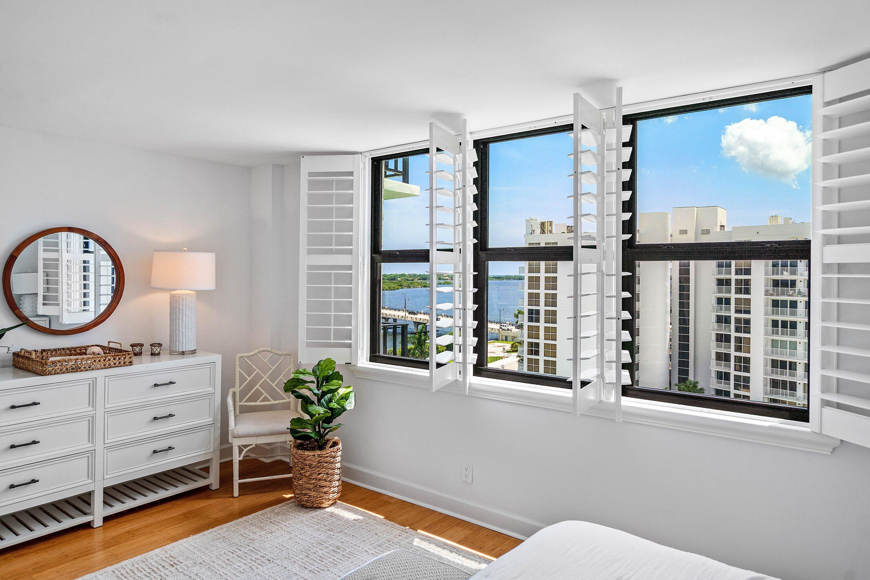 3800 Washington Road, Unit 904 West Palm Beach, FL 33405 - Photo 11 of 27 a living room with furniture and a window