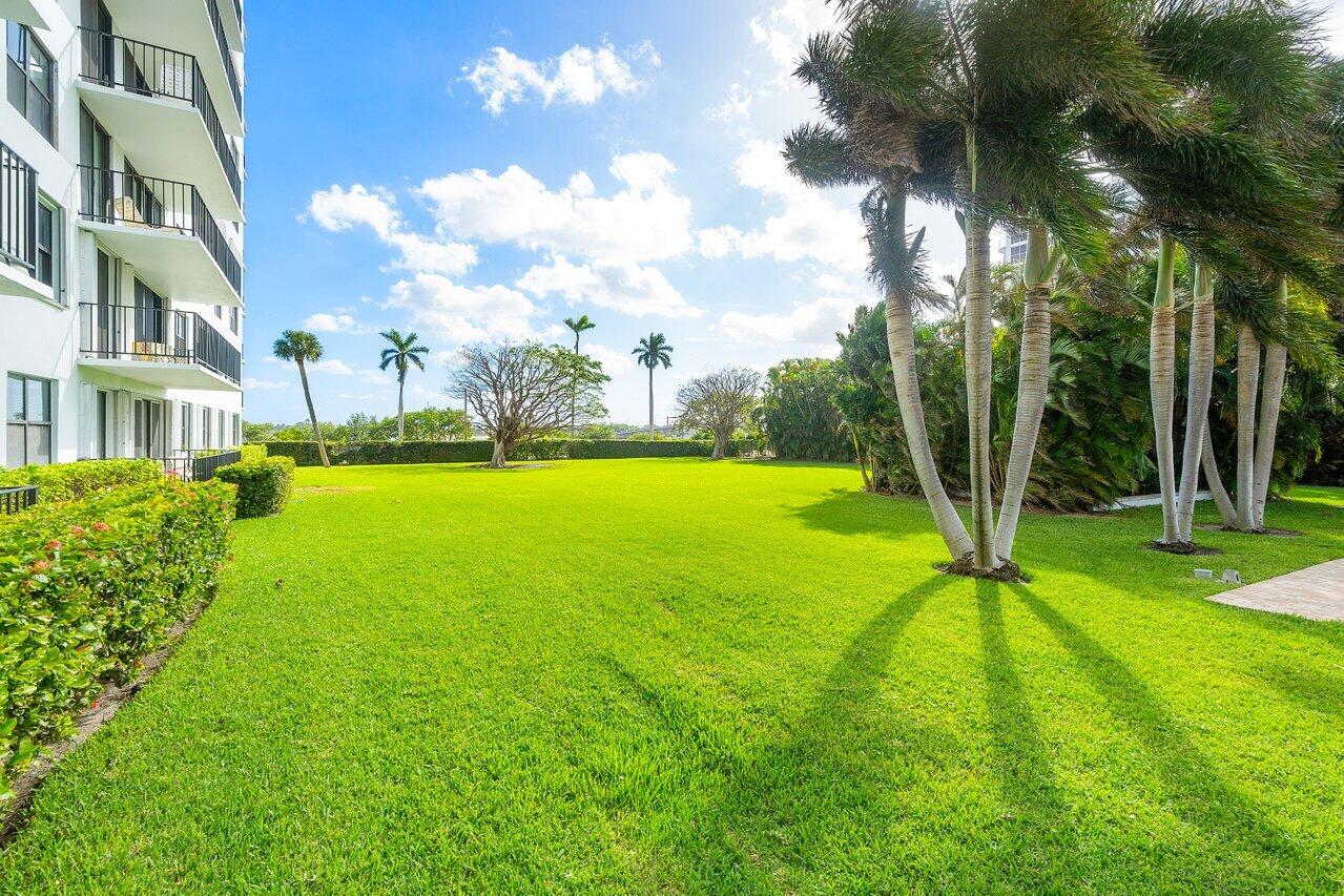 3800 Washington Road, Unit 904 West Palm Beach, FL 33405 - Photo 22 of 27 a view of building with swimming pool