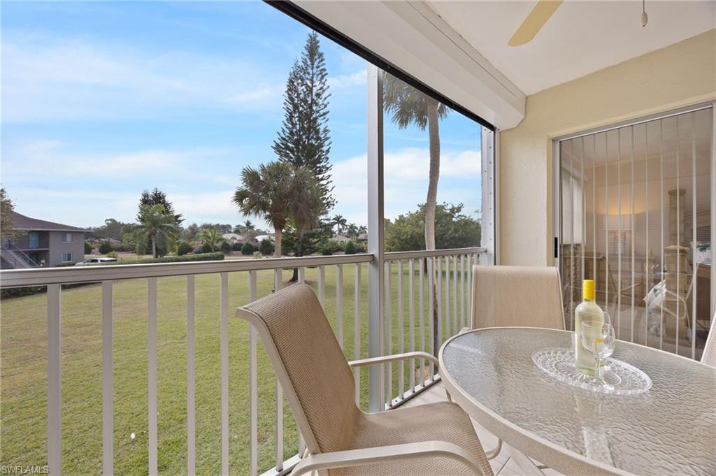 5683 Rattlesnake Hammock Road, Unit A202 Naples, FL 34113 - Photo 8 of 19 Tranquil views from the Lanai