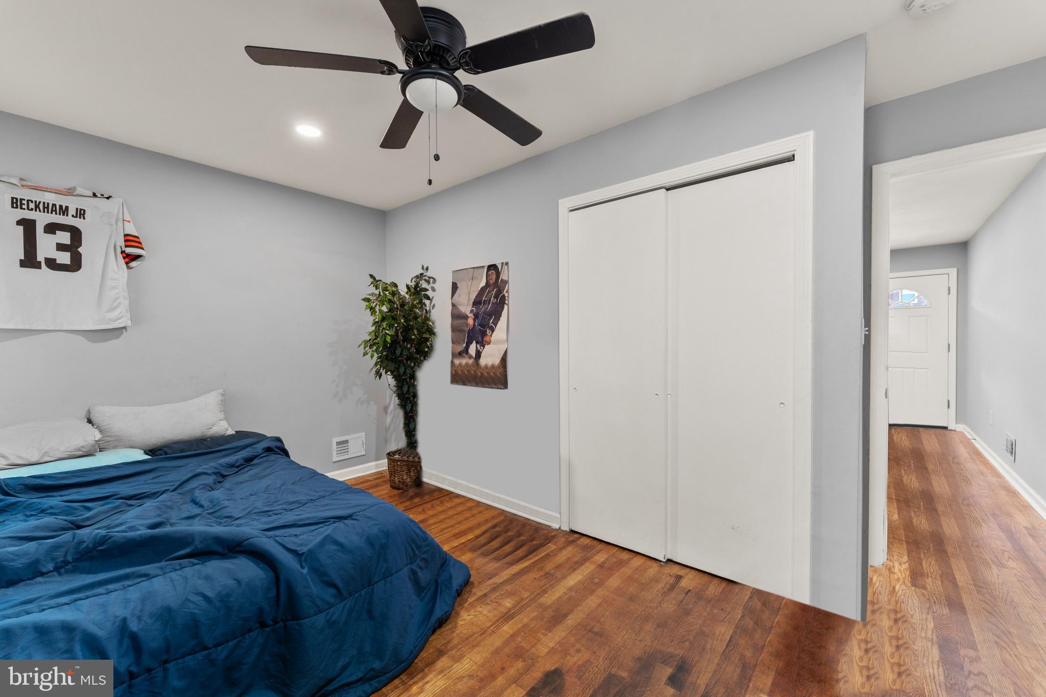 8146 Gray Haven Road Dundalk, MD 21222 - Photo 16 of 18 a bedroom with a bed and wooden floor