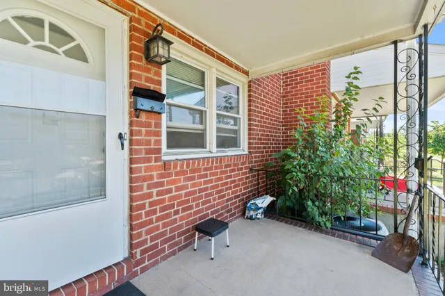 a view of a building with a yard