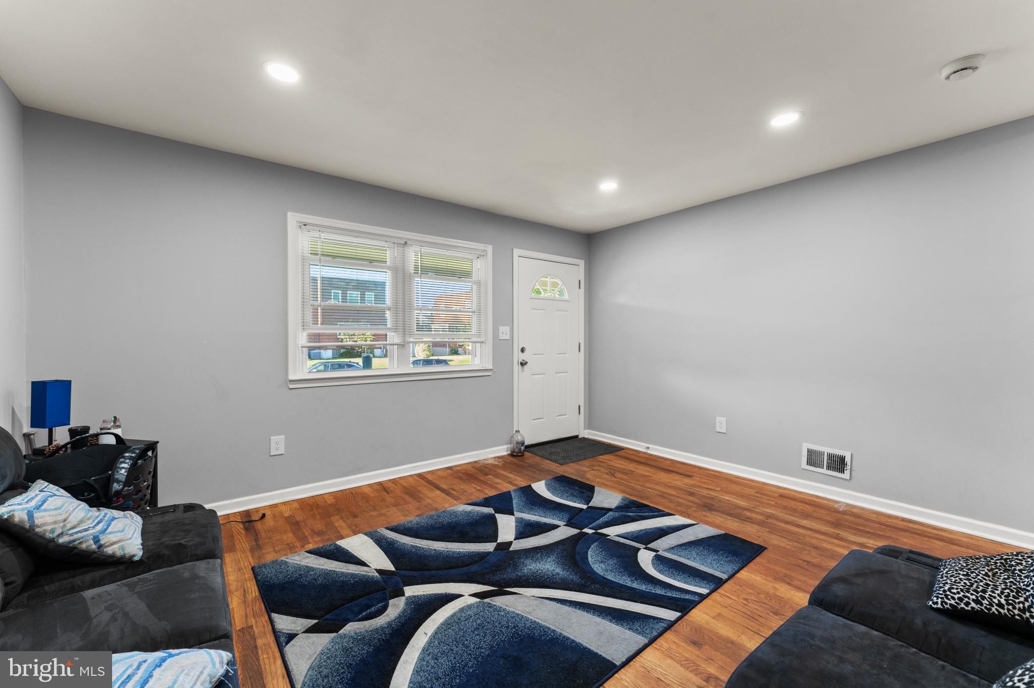 8146 Gray Haven Road Dundalk, MD 21222 - Photo 6 of 18 a living room with furniture and a window